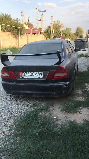 разбор матиз: Автомобиль – седан черного цвета (похоже на Daewoo/ЗАЗ Lanos по порогу — 8