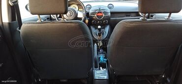 Mazda 2: 1.3 l | 2010 year Hatchback