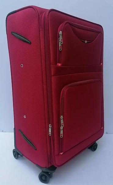 Putni koferi i torbe: Veliki putni kofer na točkiće – tekstilni, crvene boje - Prostrana — 14
