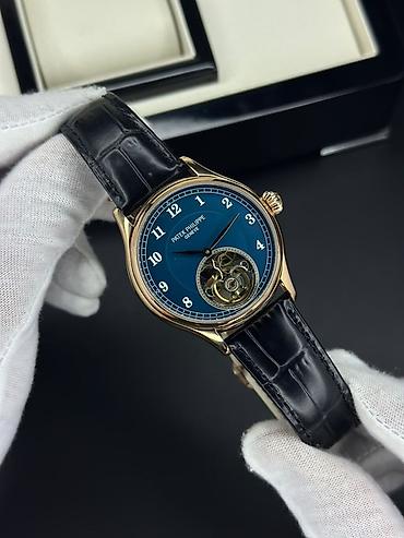 mexanik saatlar: Patek Philippe mexaniki qol saatı – klassik dizayn, turbyon üslublu — 2