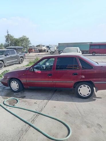 Daewoo: Daewoo Nexia: 1996 г., 1.5 л, Механика, Бензин, Седан