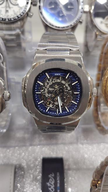 bakida saat: Patek Philippe Nautilus üslubunda kişi saatları – polad korpus və — 10