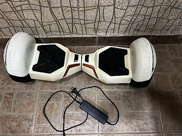 Электротранспорт: Elektroskuterl (hoverboard) – 8.5" təkərli, ağ rəngdə, LED işıqlı — 1