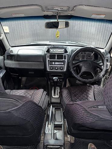 мото зонтик: Mitsubishi Pajero iO: 2002 г., 2 л, Автомат, Бензин, Кроссовер — 8