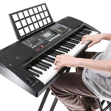 sesucaldan: Elektron piano - 61 tam ölçülü klaviş - İnteqrə olunmuş stereo — 1