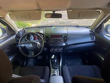 Mitsubishi: Mitsubishi Outlander: 2.4 l | 2008 il 255000 km Universal — 6