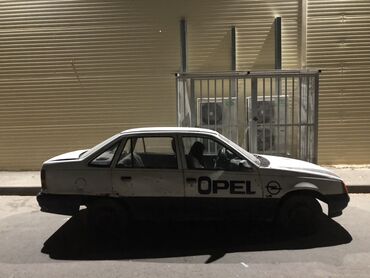 моторчик стеклоподьемника: Opel Kadett: 1991 г., Седан