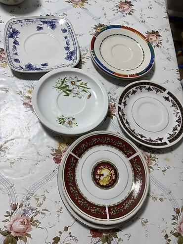 Наборы посуды: Набор столовой посуды из белого фарфора. Состав: - Стопка круглых — 11