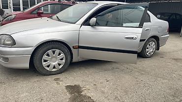 Другие автомобили: Машина Ош Шаарында Тайотта Авенсис 1999 Обоим 1.8 Механика Кузов — 5