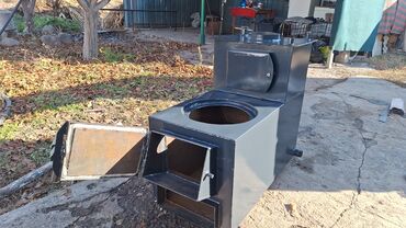 Котлы: Твердотопливный водогрейный котёл с варочной поверхностью Описание: - — 2