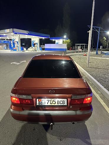 глушитель ауди: Mazda 626: 1998 г., 1.8 л, Механика, Бензин, Седан — 10