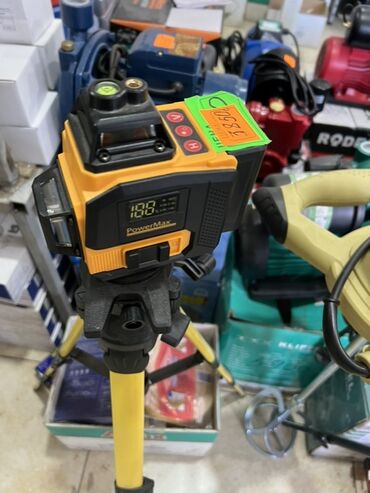 деволт лазерный уровень: Желто-черный лазерный нивелир PowerMax на штативе. Подходит для точной