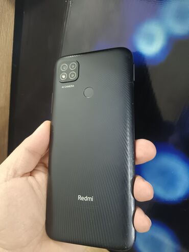 telefon mağaza: Xiaomi Redmi 9C, 64 GB, rəng - Qara, 
 Zəmanət, Barmaq izi, İki sim kartlı