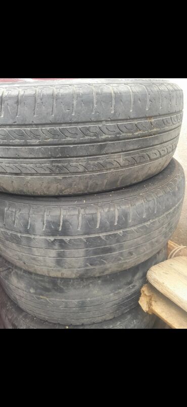 dunlop teker qiymetleri: 15 liy teker 15x195x65 4 eded biri 15 azn unv Musviq qes
