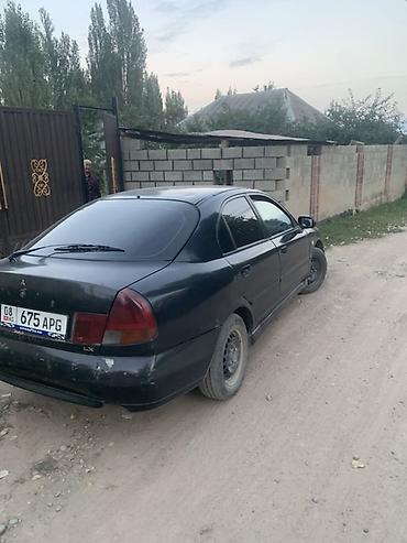 шариот митсубиси: Mitsubishi Carisma: 1998 г., 1.8 л, Механика, Бензин, Седан — 5