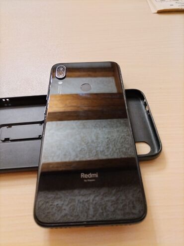 telefon ekran: Xiaomi Redmi Note 7, 64 ГБ, цвет - Черный, 
 Отпечаток пальца, Две SIM карты, Face ID