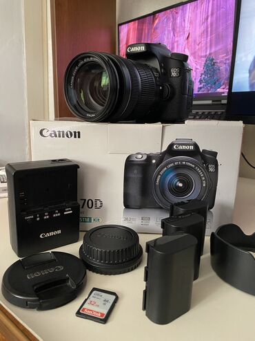 Фотоаппараты: Продаю фотоаппарат Canon 70D с объективом 18-135mm Камера в отличном