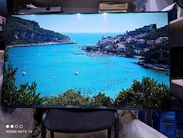 Телевизоры: Телик Телевизор SKYWORTH 55SUE9500 диагональ 140 см 55" 4k срочная — 27