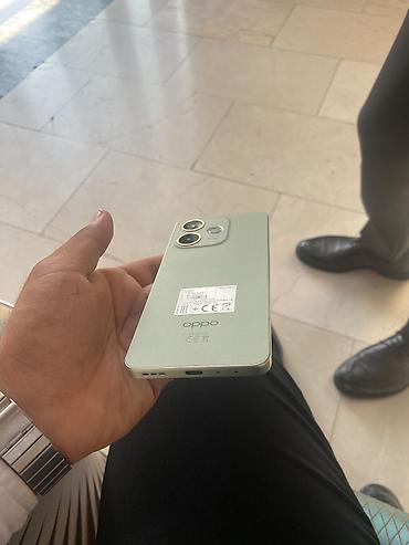 oppo reno 14 pro: Oppo A5 Pro, 256 GB, rəng - Yaşıl, Barmaq izi — 6