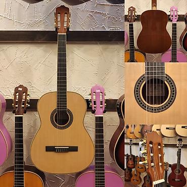 Gitaralar: Klassik gitara Smiger EC-350 Simlərin sayı: 6 Çanta hədiyyə Ölçü:4/4 — 1