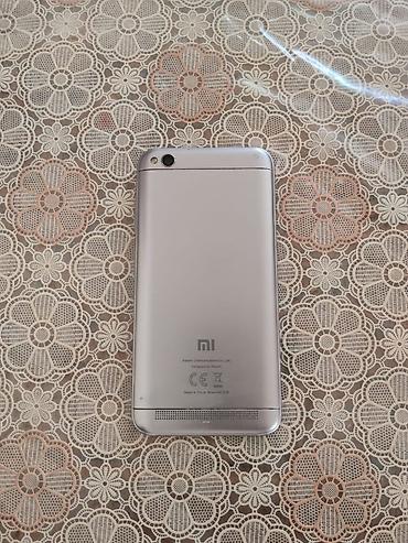 usb data modem: Xiaomi Redmi 5A– gümüşü rəngdə smartfon Xüsusiyyətlər: - 5.0 düym HD — 3