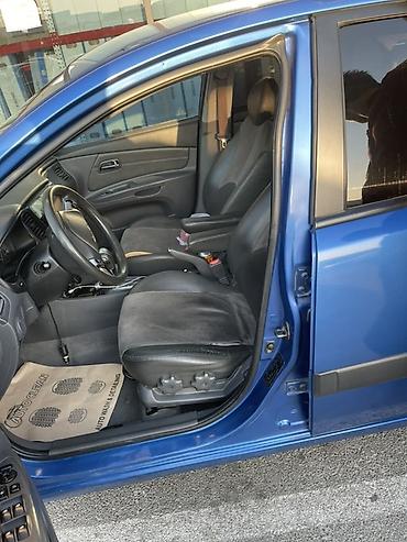 kia bongo: Kia Rio: 1.6 l | 2007 il Sedan — 7
