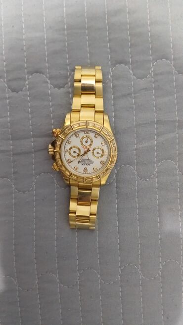 свадебное платье и аксессуары: Наручные часы Rolex с хронографом. Основные характеристики: - Корпус