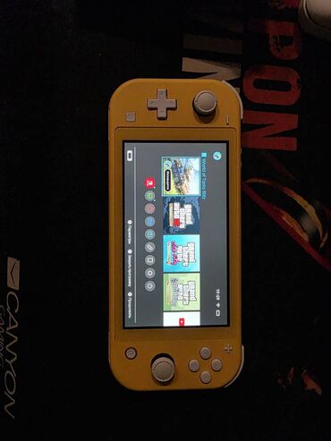 switch: Nintendo switch lite. Konsol ela veziyyetdedir, hec bir ciziqi zedesi