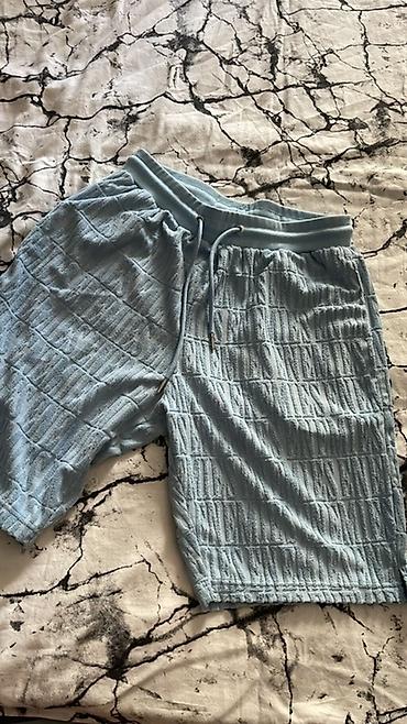 şortik kişi: Yüngül mavi rəngli kişi şortiki - Material: yumşaq, toxumalı/trikotaj — 1