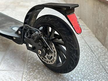 Электротранспорт: Elektrik skuter – qatlana bilən, şəhər içi rahat hərəkət üçün. Bu — 8