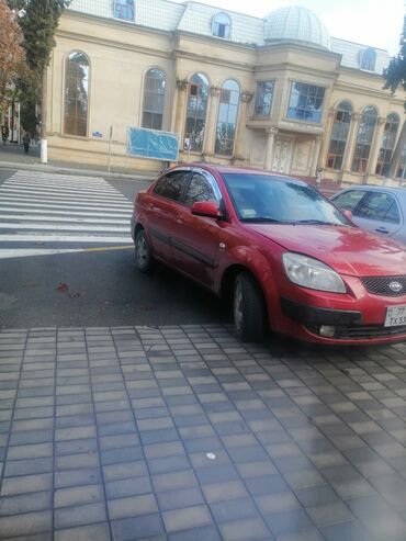 Kia: Kia Pride: 1.5 l | 2006 il Sedan — 10