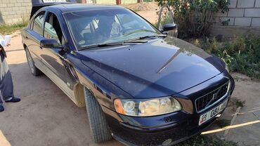 авто с российским номером: Volvo V60: 2006 г., 2.5 л, Механика, Бензин, Седан