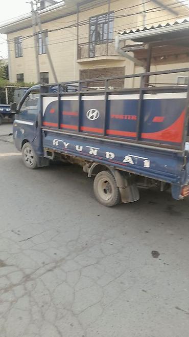 ковш на кун: Hyundai Porter (голубой), малотоннажный бортовой грузовик — 2