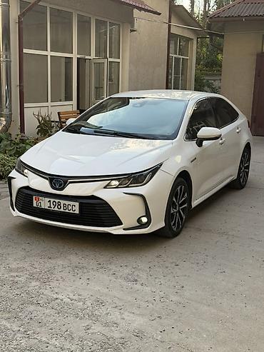 Унаа: Toyota Corolla: 2022 г., 1.8 л, Вариатор, Гибрид, Седан — 2
