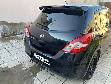 bmw e 39: Nissan Tiida, qara rəng, hetçbek gövdə. - Güclü və qənaətcil benzin — 7