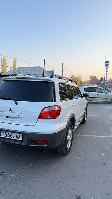 lancer 9: Mitsubishi Outlander: 2004 г., 2.4 л, Автомат, Газ, Кроссовер — 7