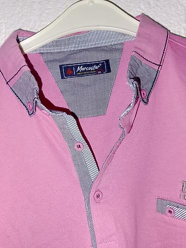 Majice: Muške polo majice – 2 komada Svaka majca po 600dinara 1) Infinity Man — 12