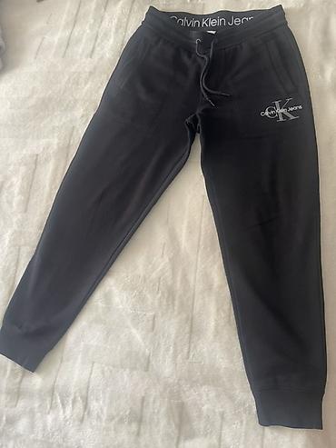 jogger şalvar: Calvin Klein Jeans kişi jogger şalvarı - Rəng: qara - Model: CK Jeans — 3