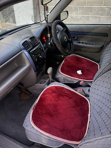 мисубиси спейс стар: Mazda Demio: 2001 г., 1.3 л, Автомат, Бензин, Хэтчбэк — 4