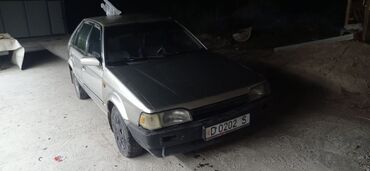 корея авто: Mazda 323: 1989 г., 1.4 л, Механика, Бензин, Хэтчбэк