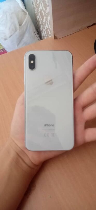 стоимость 10 айфона: IPhone X, Б/у, 64 ГБ, Серебристый, Зарядное устройство, Защитное стекло, Чехол, 100 %