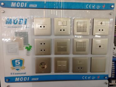 Ремонт и строительство: MODI Electric tərəfindən istehsal olunan rozetka və açarların nümayiş
