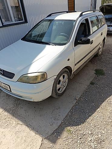 е 303 302: Opel Astra: 1999 г., Механика, Бензин, Универсал — 1