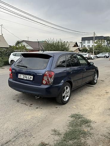 byd leopard 5: Mazda Familia: 2003 г., Универсал — 3