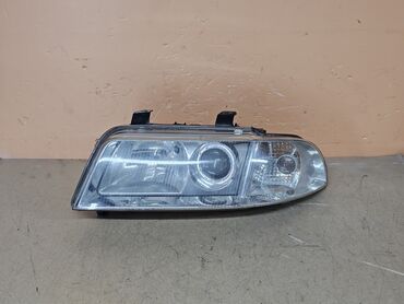 реставрация рефлектора фар: Передняя левая фара Audi 2000 г., Б/у, Оригинал