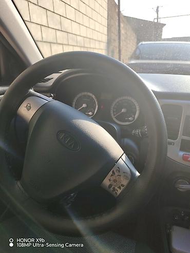 2003 ford transit: Kia Rio, mavi rəng, hetçbek kuzov. Texniki xüsusiyyətlər və təchizat — 7
