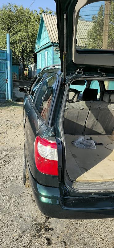 япония машина: Mazda Capella: 2000 г., 2 л, Механика, Бензин, Универсал — 5