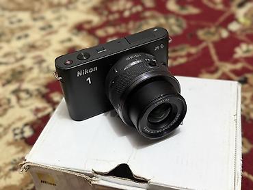 Фотоаппараты: Беззеркальная камера Nikon 1 J1 с объективом 1 NIKKOR VR 10–30mm — 1