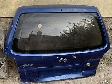 с 500: Крышка багажника Mazda Demio (DW, 1998–2002), синяя. - Оригинальная — 1