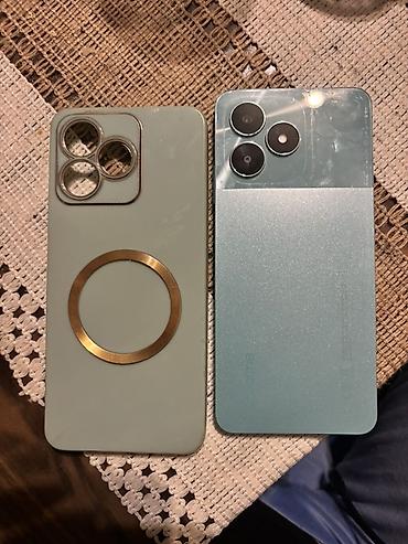Realme: Realme C51, zelena boja - Ekran: (oko) sa „waterdrop” notch‑om; — 6